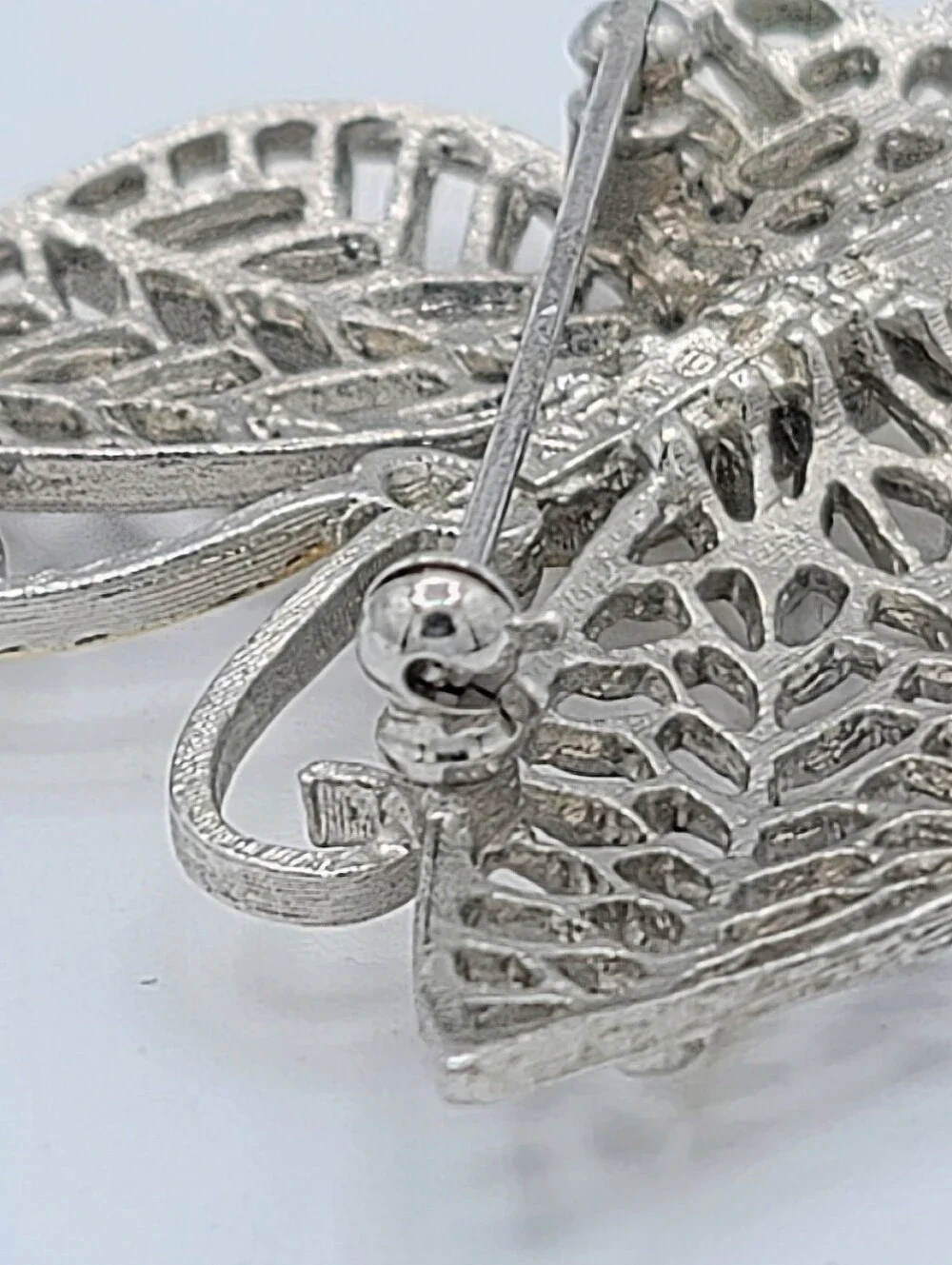 Avon Butterfly Brooch Two Tone Gold Silver Openwork Blue Rhinestone Eyes Vintage